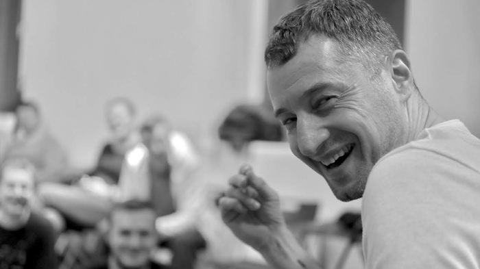 Misha Kostrov working with a participant