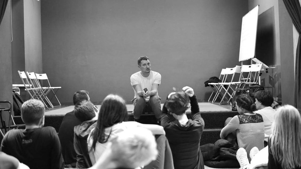 Misha Kostrov leading a group